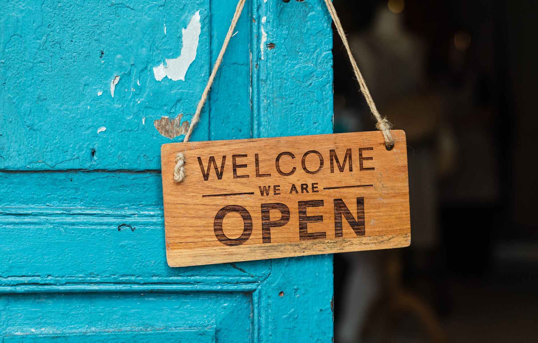 wooden welcome signage