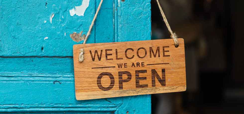 wooden welcome signage